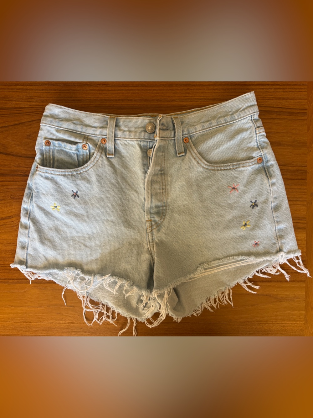 Levi's Light Wash Frayed Denim Cutoff Shorts with Colorful Star Embroidery
